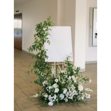 Floral arrangement for a sign